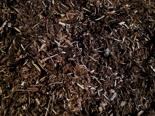 Shredded hardwood bark mulch has a fine texture and a warm, natural look that is perfect for all gardens.
