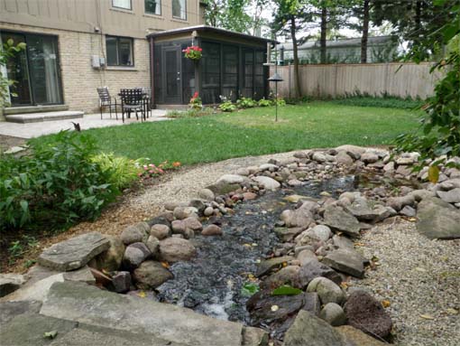 We installed a pondless waterfall for our clients, who are avid birders. They report over 20 bird species have visited their garden since.