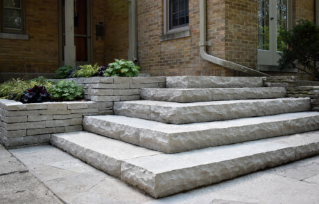 Rockfaced Eden Limestone steps with raised limestone planter and Eden Limestone landing