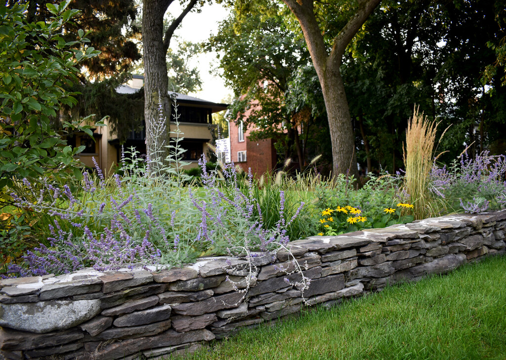 Pennsylvania Fieldstone retaining wall with prairie plantings