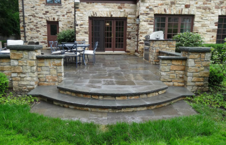 patio and curved stoop with bluestone paving and treads-Nature's Perspective Landscaping