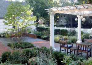 outdoor rooms with lush plantings and pergola-Nature's Perspective Landscaping
