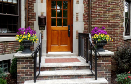 Front walk with brick steps and mortared brick pillars to match home