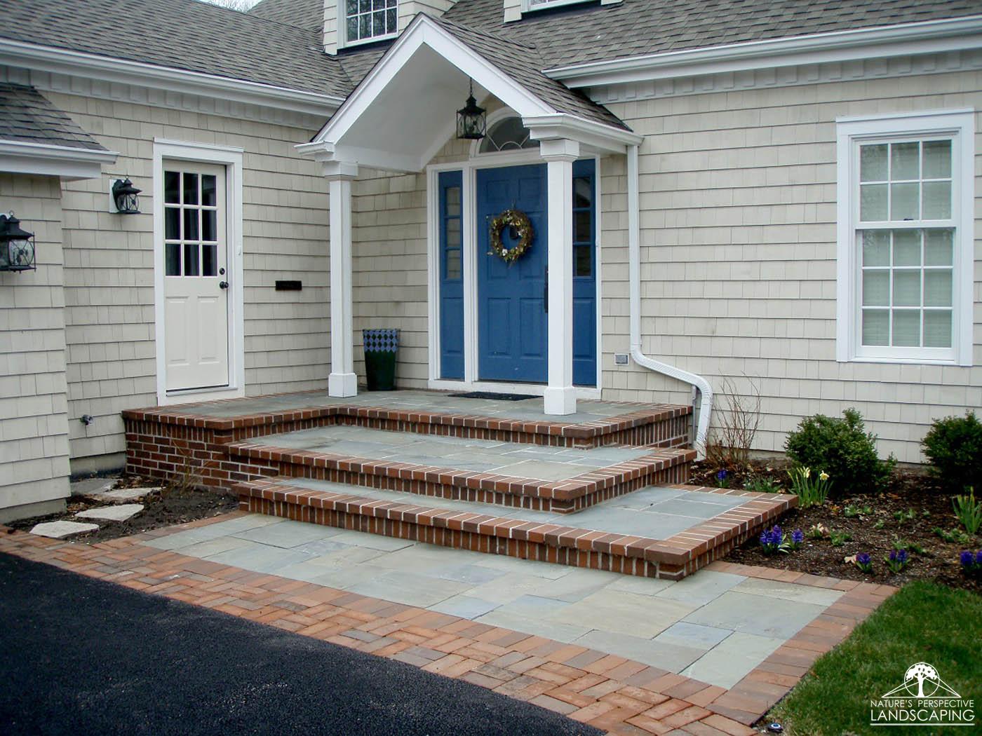 brick and bluestone terraced front stoop - Nature's Perspective Landscapingtwo-door-brick-bluestone-stoop