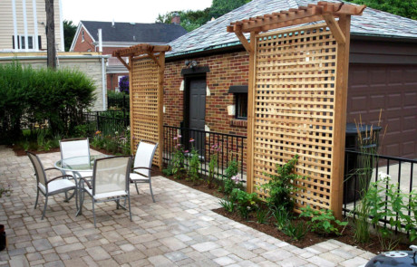 Small yard with patio and lattice privacy screens