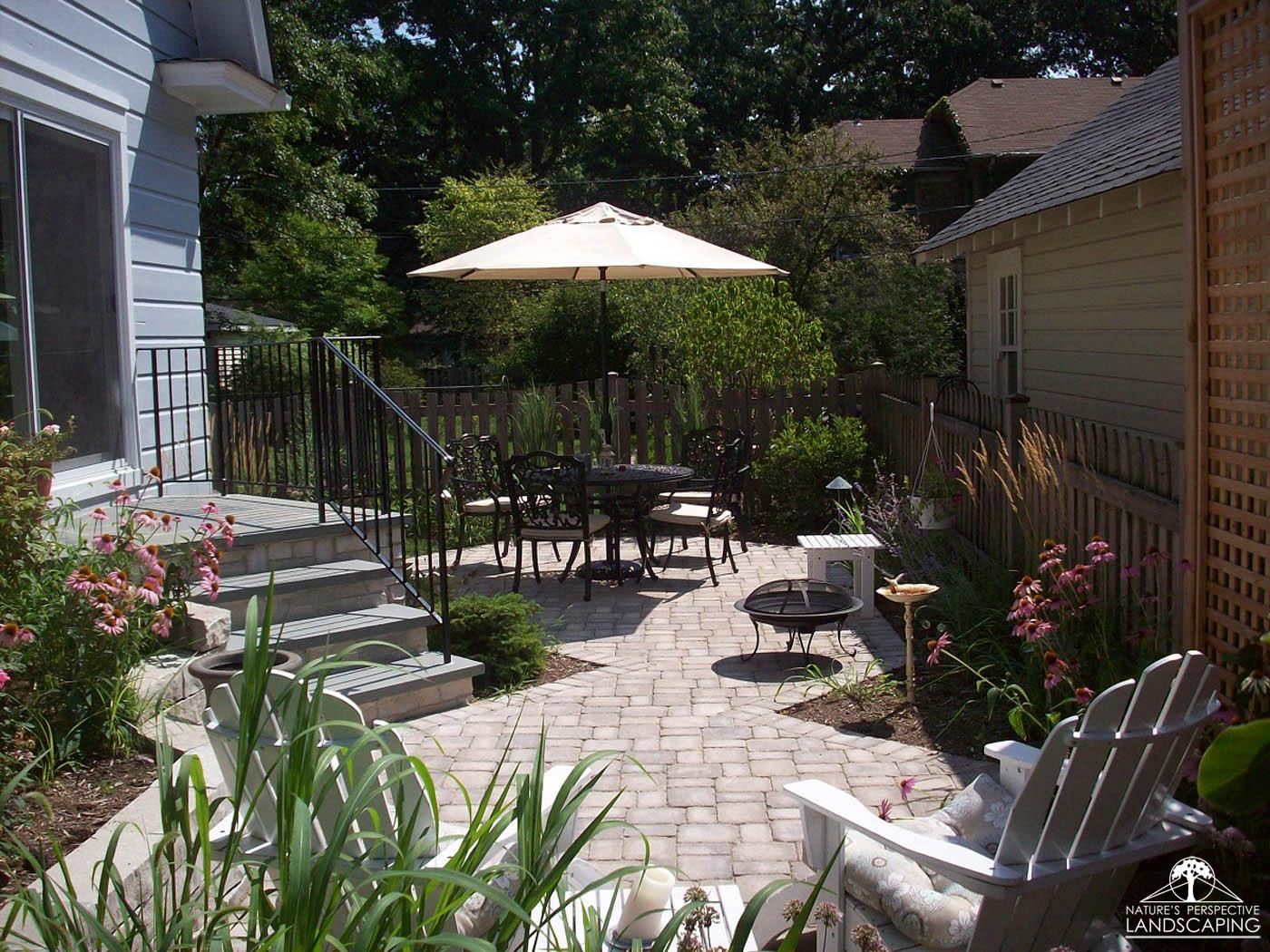 small backyard with angled steps and plantings - Nature's Perspective Landscaping