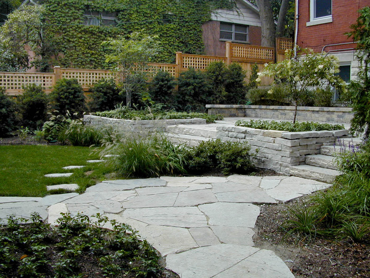 loosely laid limestone walks, limestone walls and steps - Nature's Perspective Landscaping