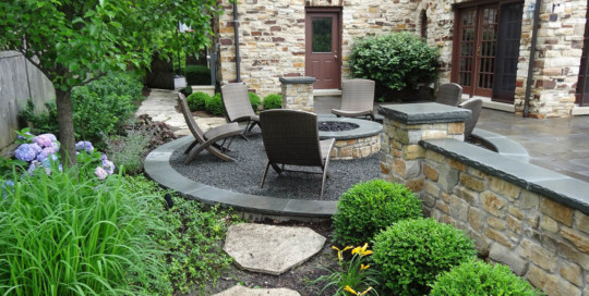 round fire pit area, bluestone treads and copings, mortared stone walls and fire pit