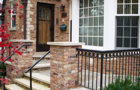 New front stoop with brick pillars to match home