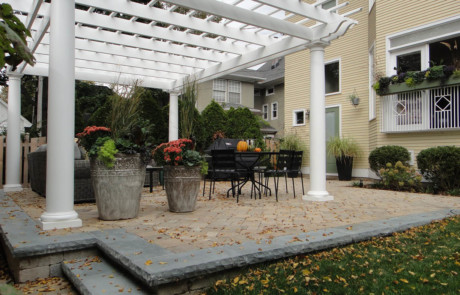 fiberglass pergola, brussels-block patio, autumn - Nature's Perspective Landscaping