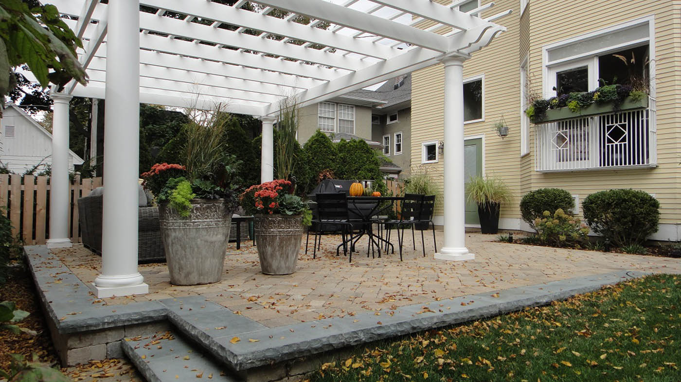 fiberglass pergola, brussels-block patio, autumn - Nature's Perspective Landscaping