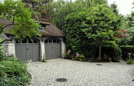 Brussels Block paver driveway with angled pattern and plantings