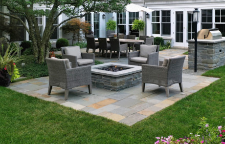 Mortared bluestone gas-burning fire pit with Bluestone copings in patterned Bluestone patio
