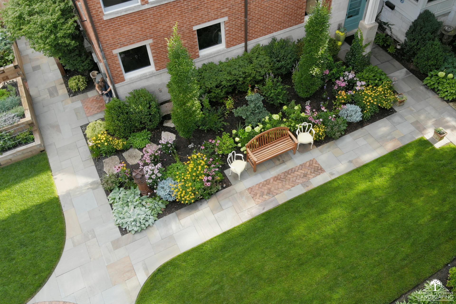 bluestone walk with perennial bed, bench nook