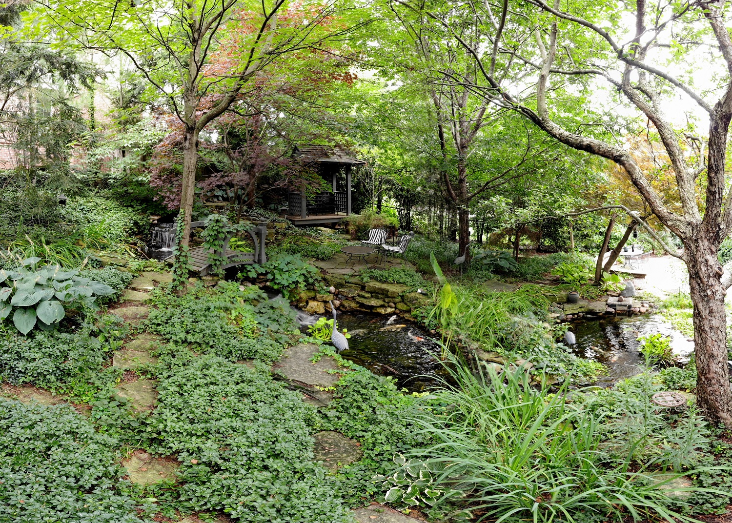 Japanese tea house with koi ponds and shade plantings