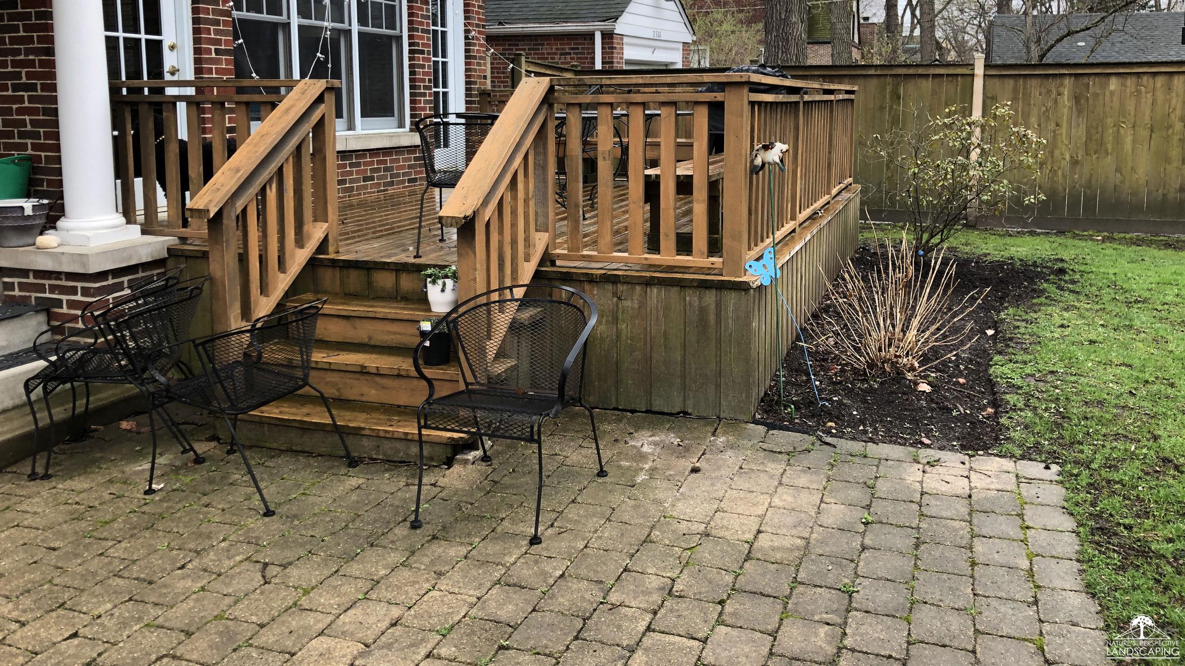 before photo of rear deck and old pavers